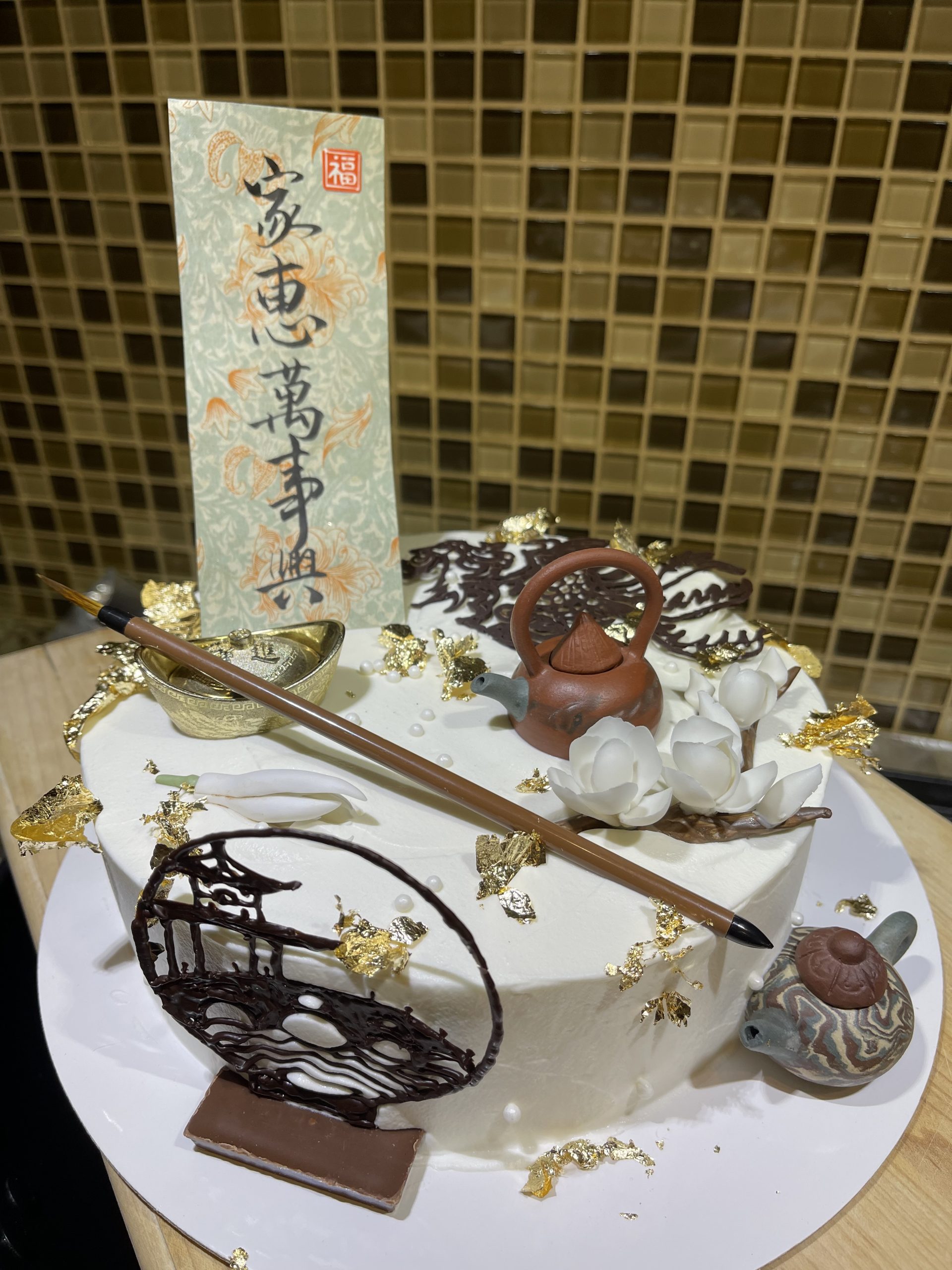 茶壶、书法与玉兰花中式蛋糕
